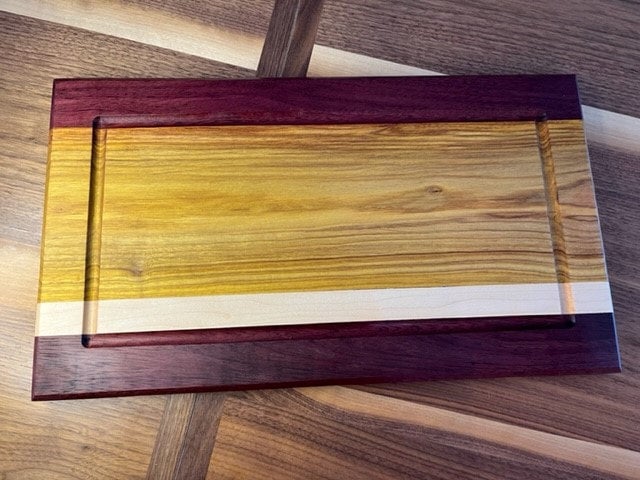 Deals Purpleheart, Maple, Wenge and Epoxy charcuterie board.